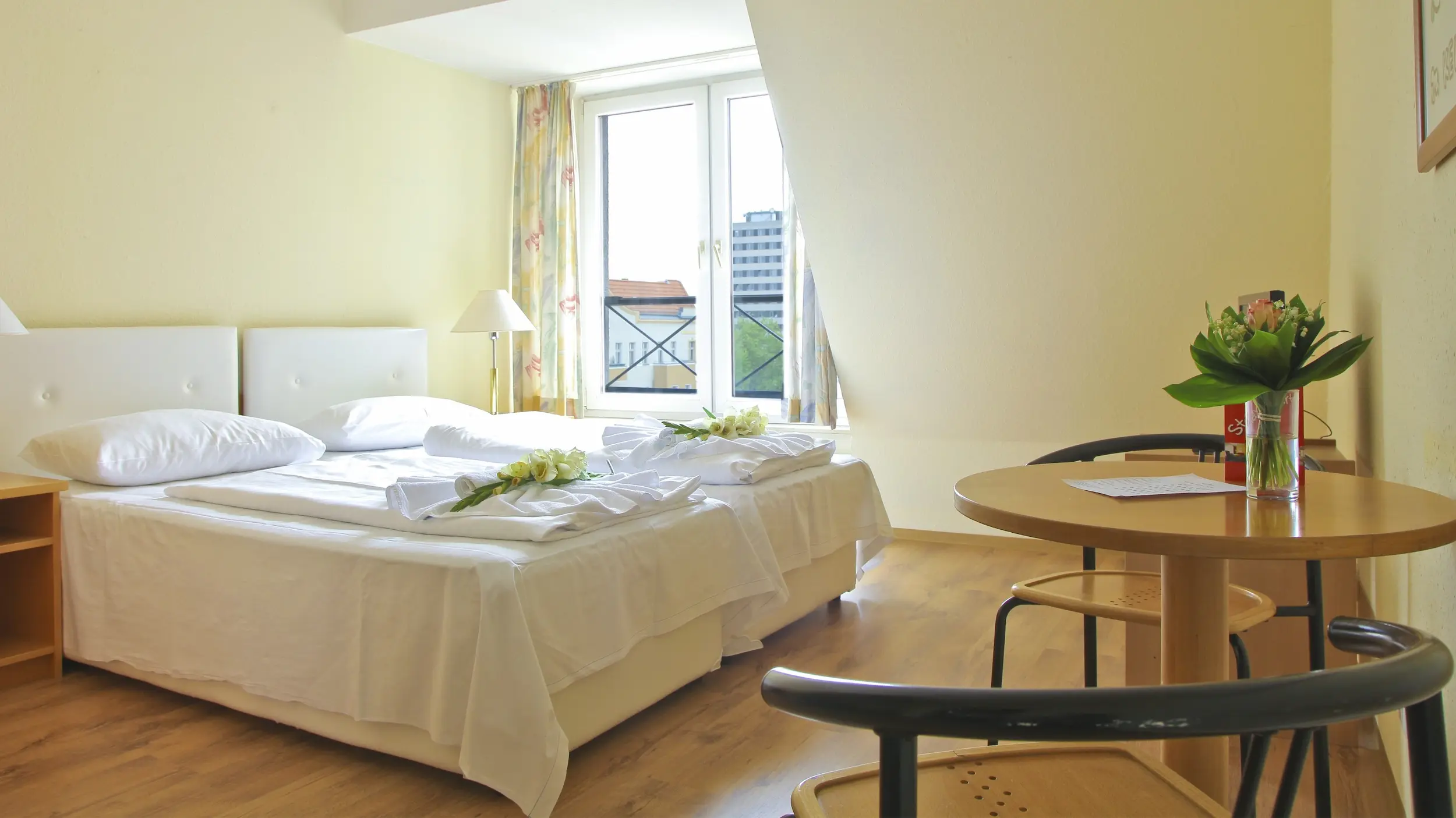 wooden frame bed for vacation rental apartments